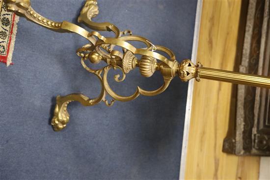A circular specimen marble top brass tripod table, Diameter 38cm, H.72cm